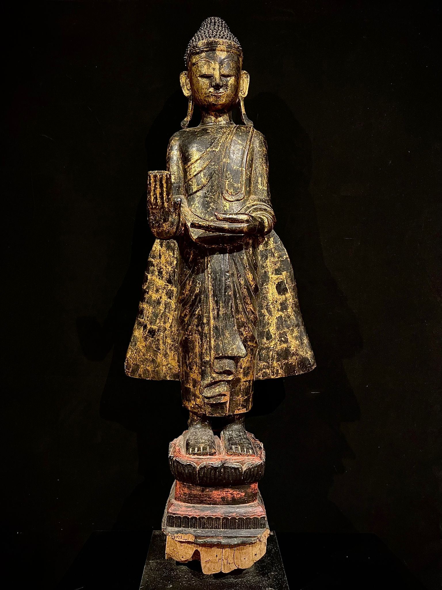 Gilded lacquered wood standing Buddha in Madhya mudra- 7230